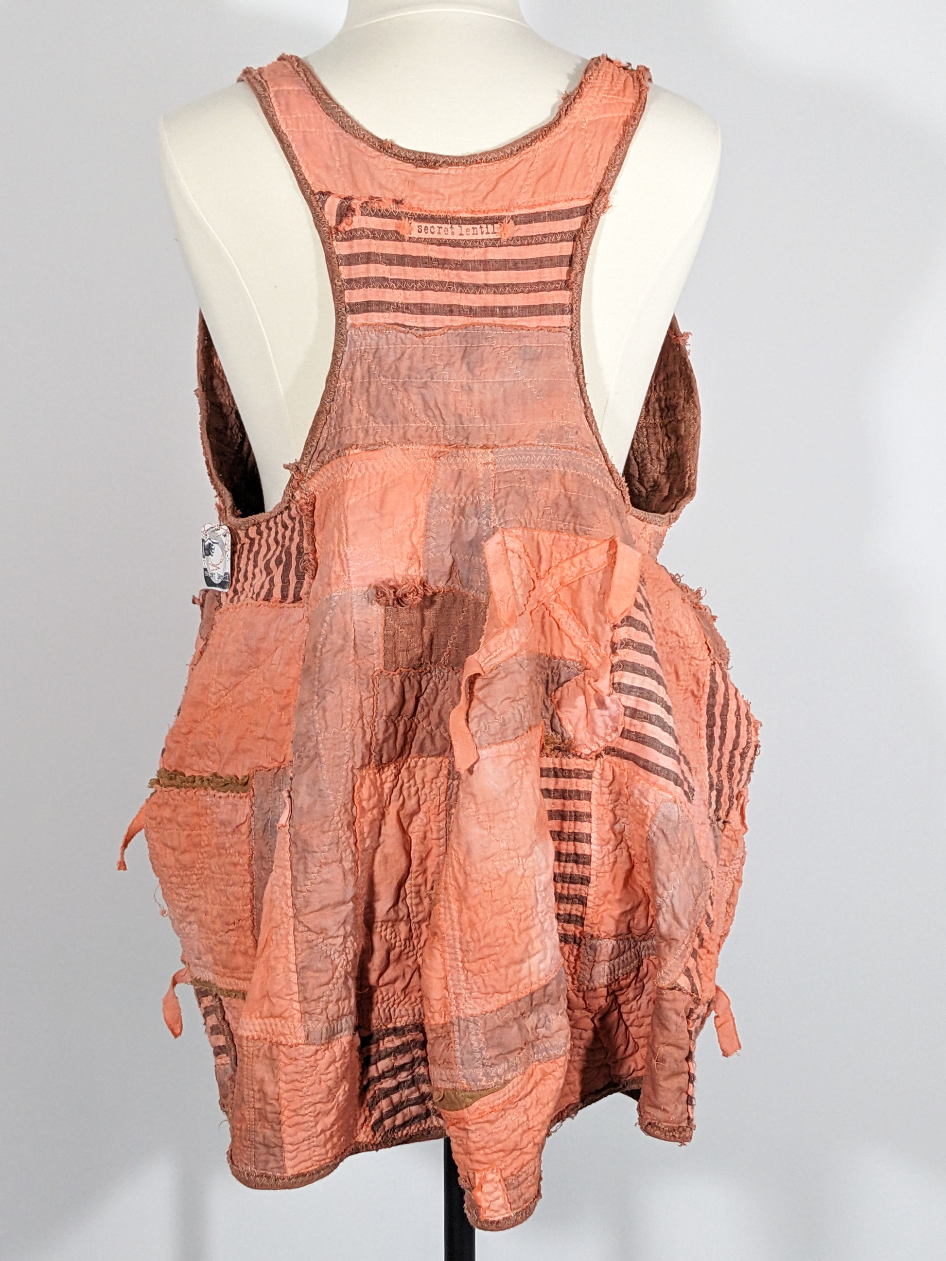 Secret Lentil Past-Perfect artifacted pod vest