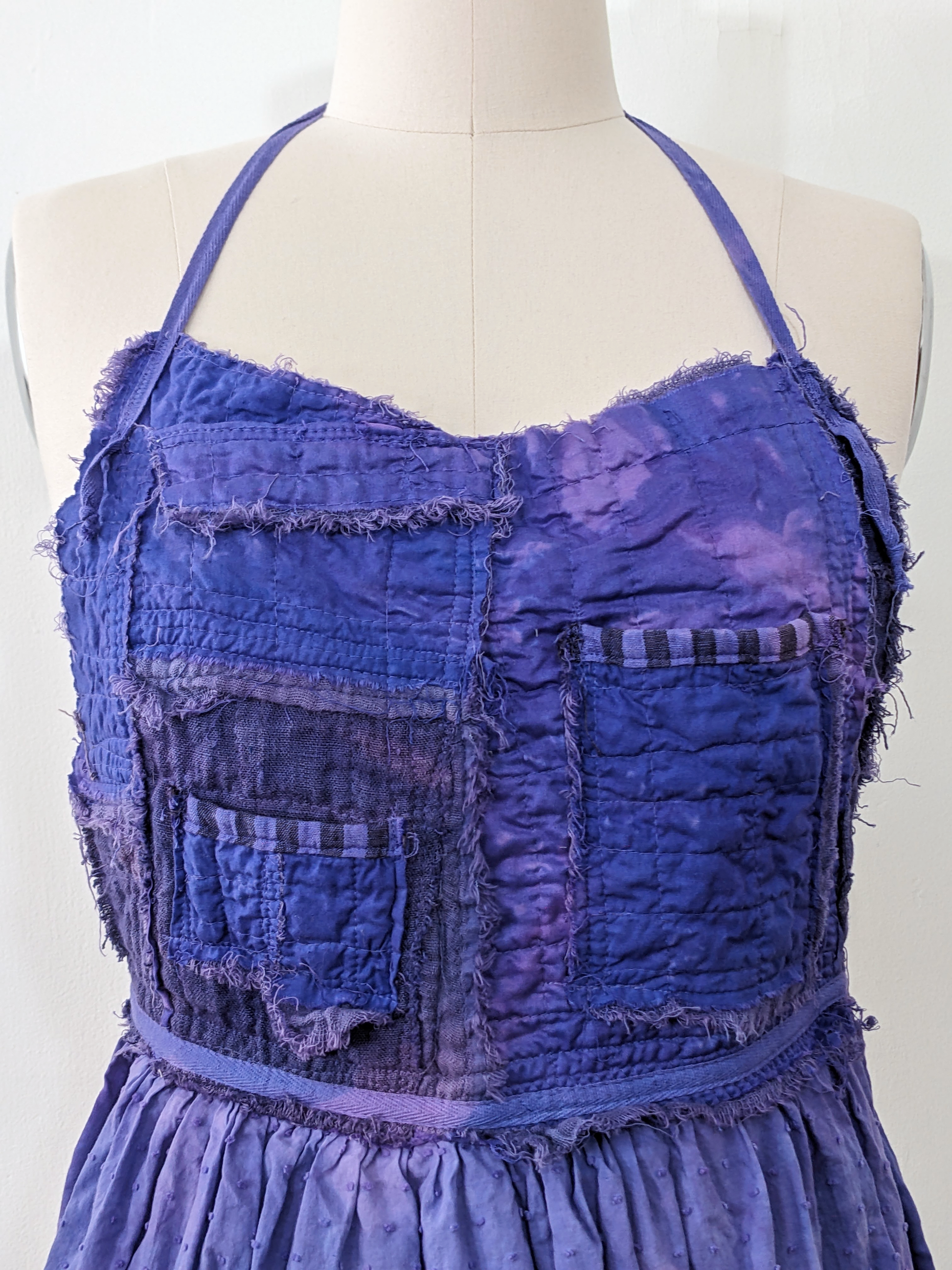 Secret Lentil purple apron, top detail