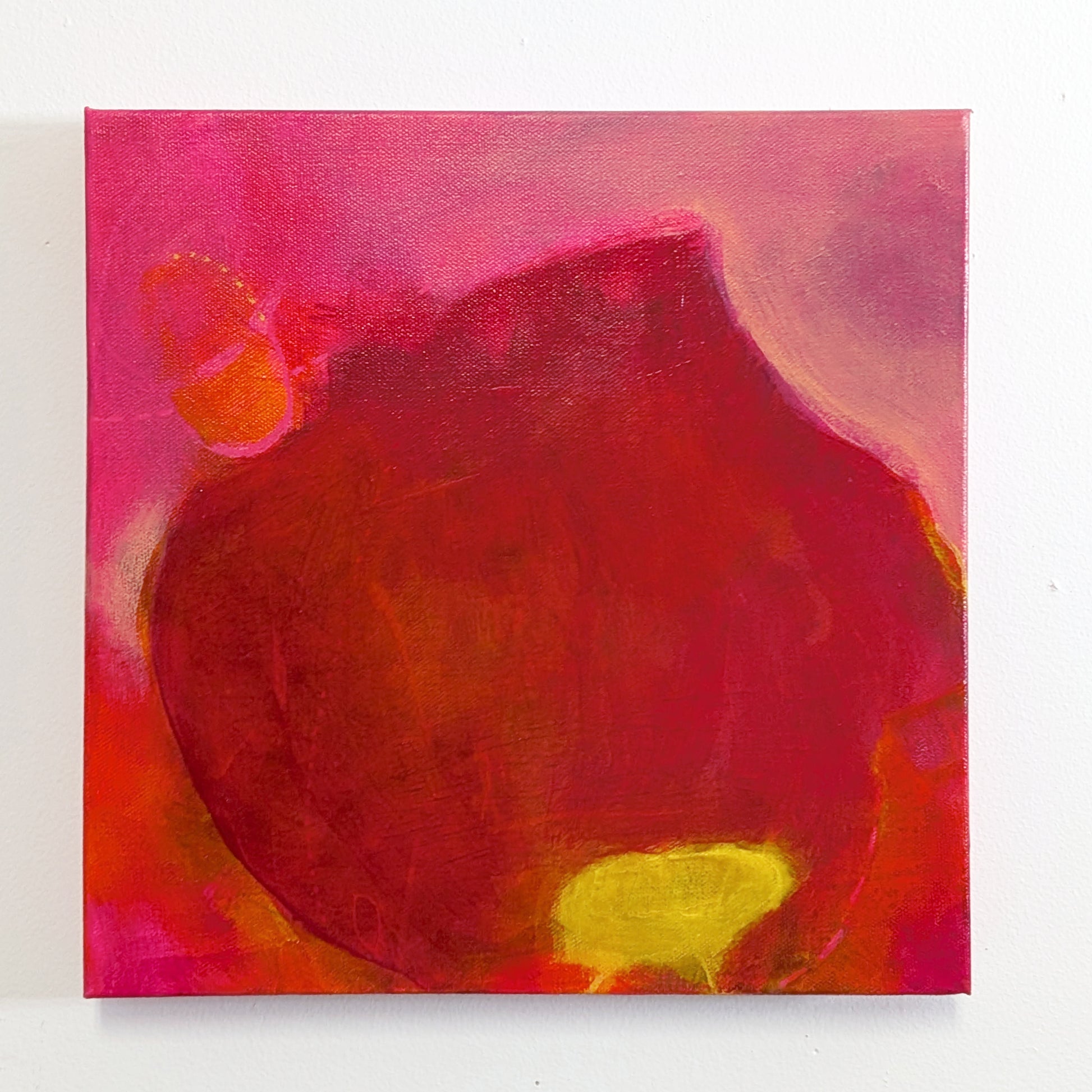 tabla beet science by helen carter. Abstract painting featuring a large central dark red and brown organic shape with bright pink, orange, and yellow areas around it.
