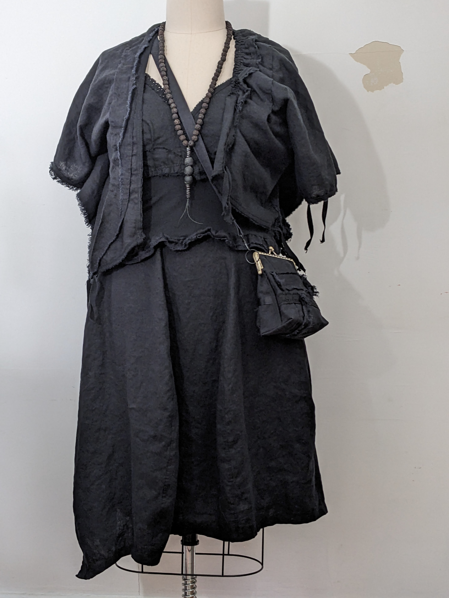 secret lentil black skirt, camisole, jacket, necklace and bag