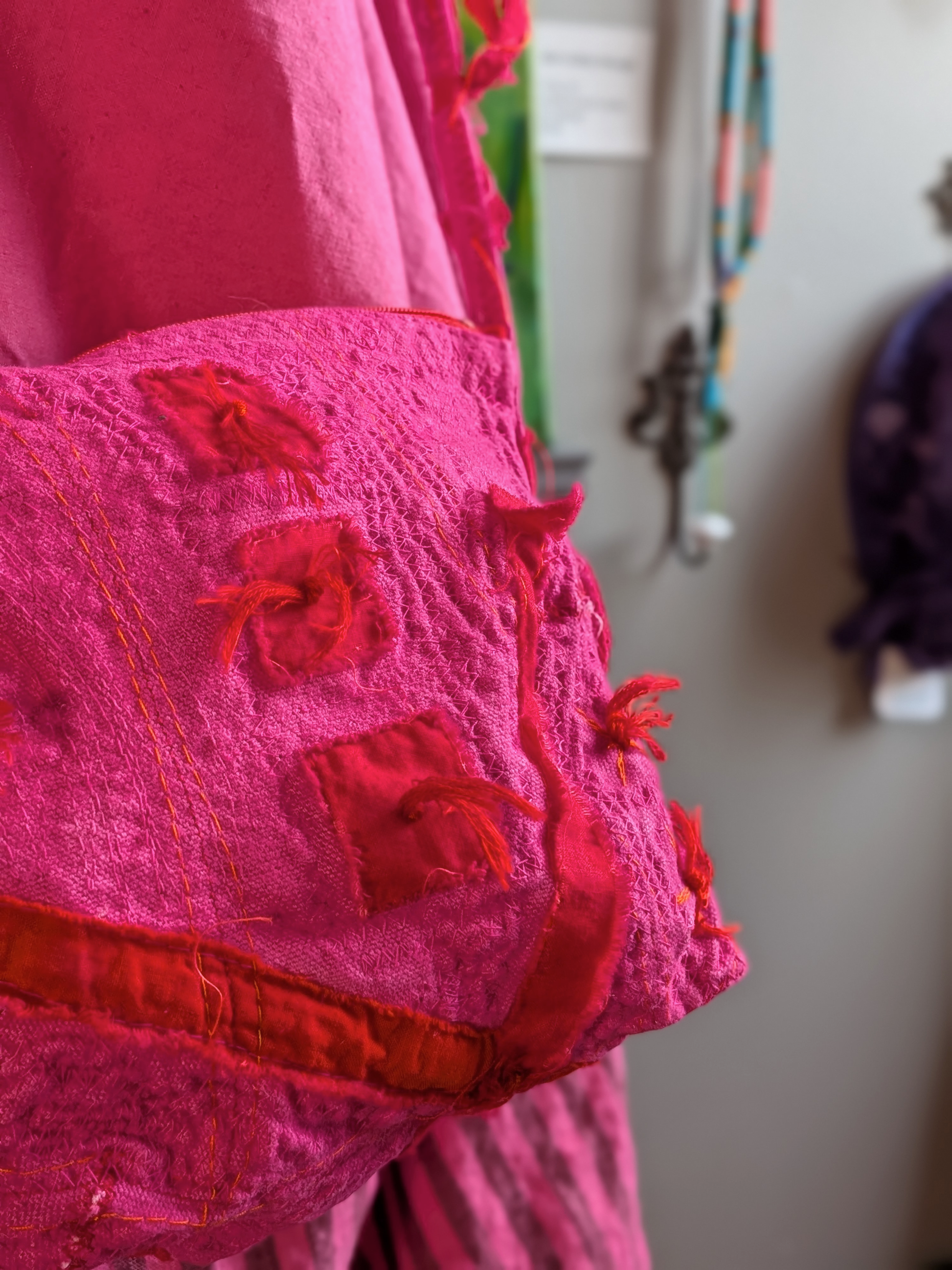 firewitch preparation bag: fuchsia canvas with patches, hand stitching, zipper closure and a crossbody strap. from secret lentil