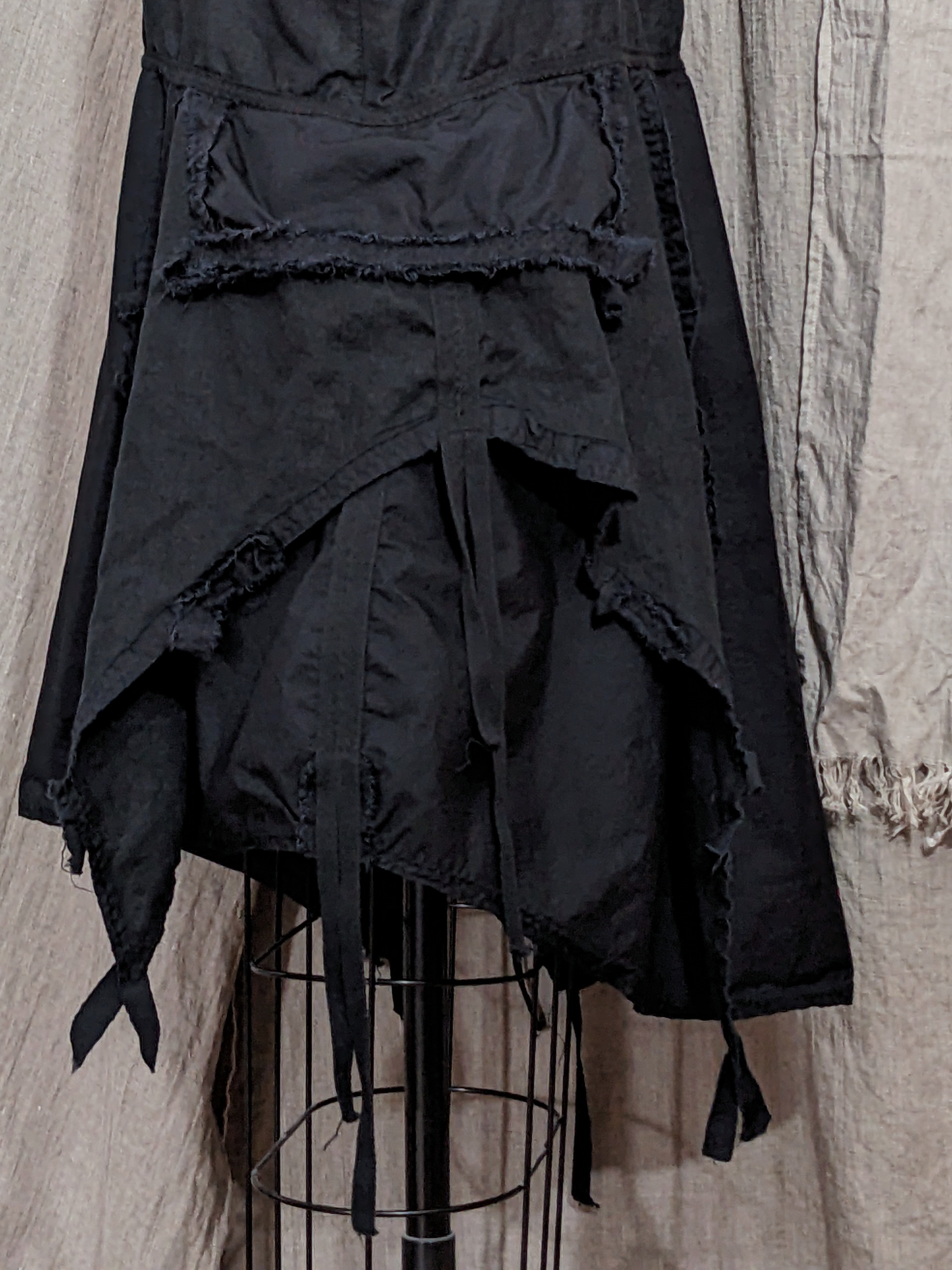 detail, Secret Lentil Mourning Pinafore (Black, with side ties)