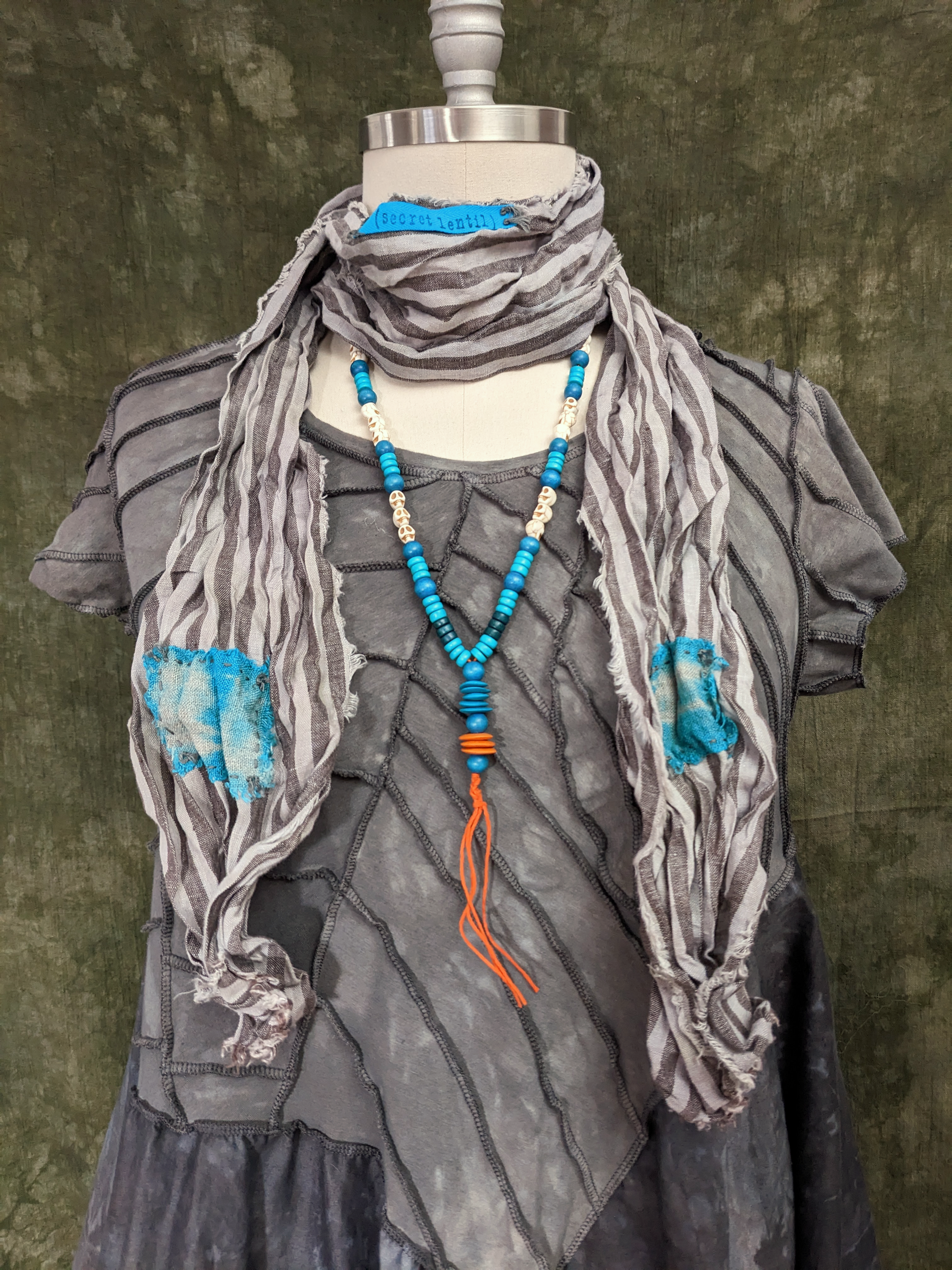 silver-gray and turquoise hand-dyed striped linen scarf with hand-stitched patches